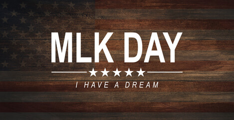 Happy Martin Luther King Day concept. American flag againt dark stone background. I have a dream.