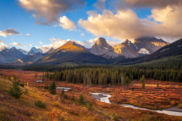 River flowing through an autumn valley in the canadian rockies