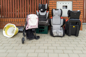 Old Child Car Seats and Stroller Awaiting Collection