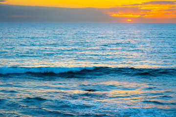 Orange sky over the sea at sunset