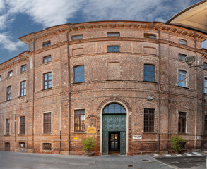 Fossano, Italy - September 27, 2024: SS Trinita major hospital, exterior entrance ancient brick...