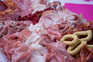 Closeup of sliced pork assortiment at the party buffet