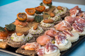 Closeup of mini toasts assortment  at he buffet