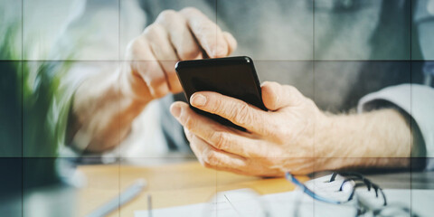 Hands using mobile phone, geometric pattern