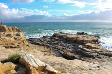 Rock formations at Senjojiki coast with ocean view under blue sky