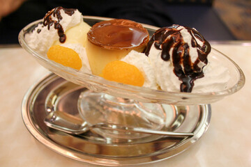 Retro Japanese pudding a la mode dessert with ice cream and fruit