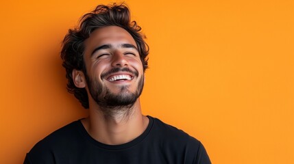 Fototapeta premium Portrait of a happy handsome man in a shirt with laughing