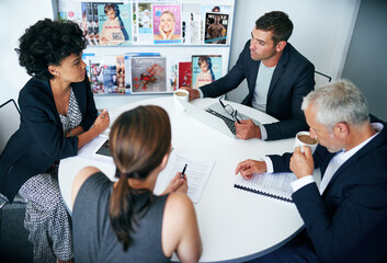 Office, conversation and meeting in boardroom, group and discussion with laptop, paperwork or...