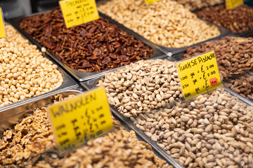 Seeds, nuts, tasty, sweet or salted goods, snacks. Haagse Market in The Hague, Netherlands.