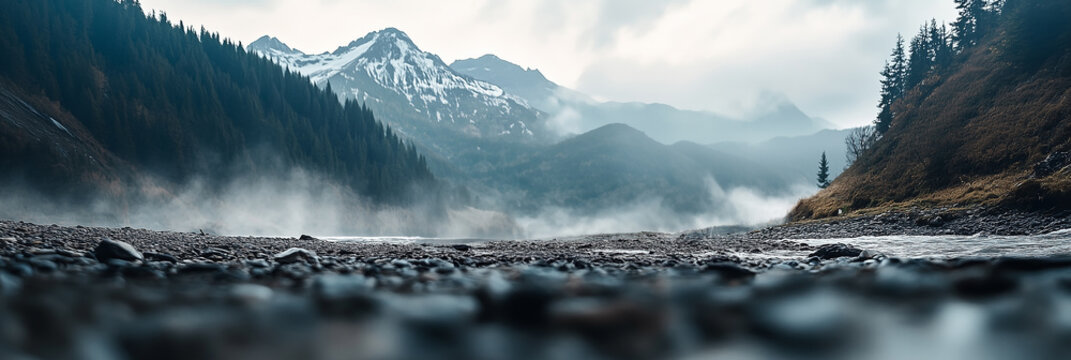Scenic outdoor landscape with rugged terrain featuring mountains, rivers, and dense forests. Ideal natural backdrop for showcasing off-road vehicles or new car launches. Perfect for adventure-themed a