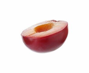 Half of ripe plum isolated on white