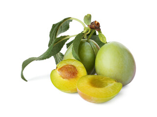 Whole and cut ripe plums isolated on white