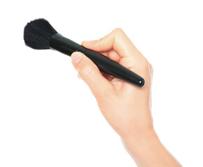 Woman hand holds black cosmetics brush, isolated on transparent background, cosmetics and visage concept