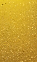 a close-up view textured surface with numerous small, round, and irregularly shaped droplets yellow liquid, possibly oil or paint, scattered across the surface