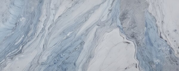 a close-up view marble surface with a swirling pattern of blue and white marble