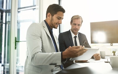 Businessmen, tablet and legal collaboration in office, talking and meeting for justice in...