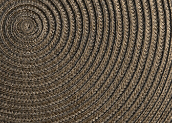 Fototapeta premium A spiral design table mat closeup in brown
