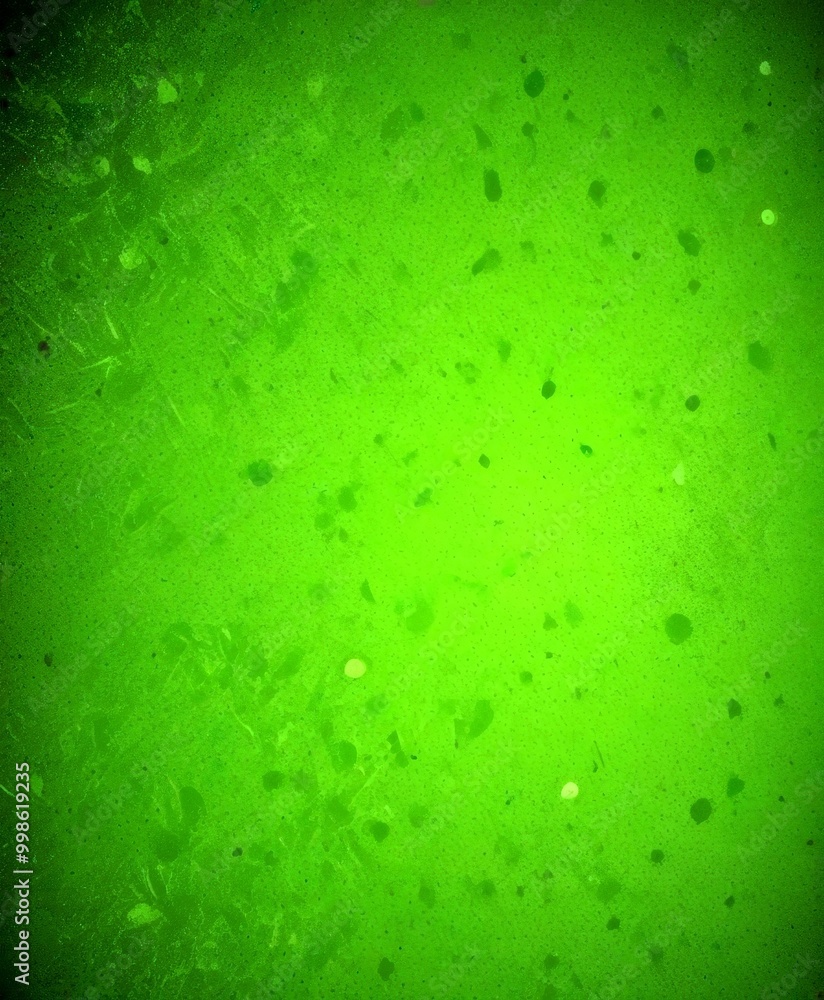 Poster a close-up view green, textured surface with small, irregularly shaped dots scattered throughout, creating a sense of depth and complexity