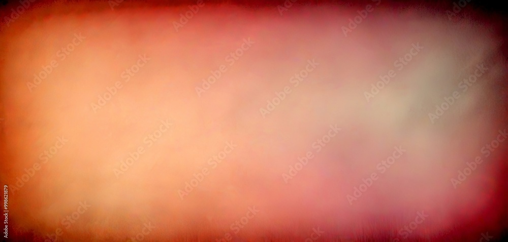 Aufkleber a blurred, abstract background with a gradient of pink and orange colors, creating a soft, hazy effect