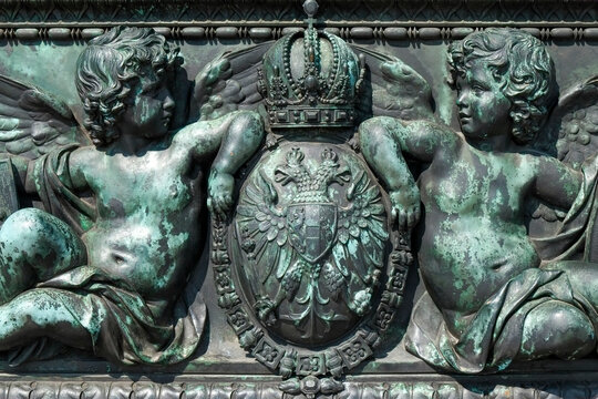 Vienna, Austria, Europe. Bronze detail of angels and royal crest