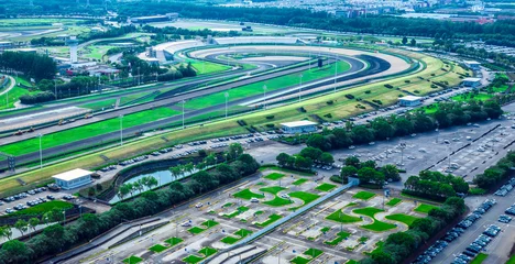 Fotobehang Formule 1 Aerial view of curvy racing track road in Shanghai  © zhao dongfang