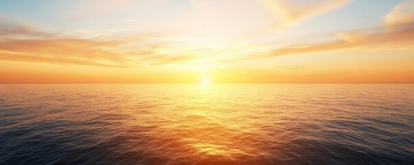 Obraz premium Serene ocean sunset with vibrant colors and gentle waves reflecting the light.