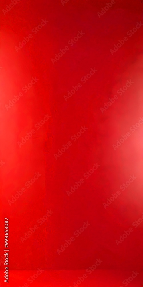 Poster a red wall with a gradient effect, transitioning from a darker shade at the top to a lighter one at the bottom