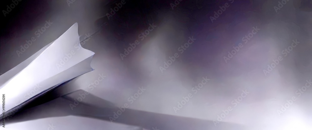 Poster a close-up view piece of paper, with a blurred background that appears to be a gradient of gray and 