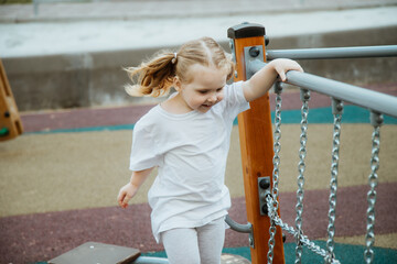 A Playful Child Happily Enjoying Various Outdoor Activities Under the Bright Sunshine