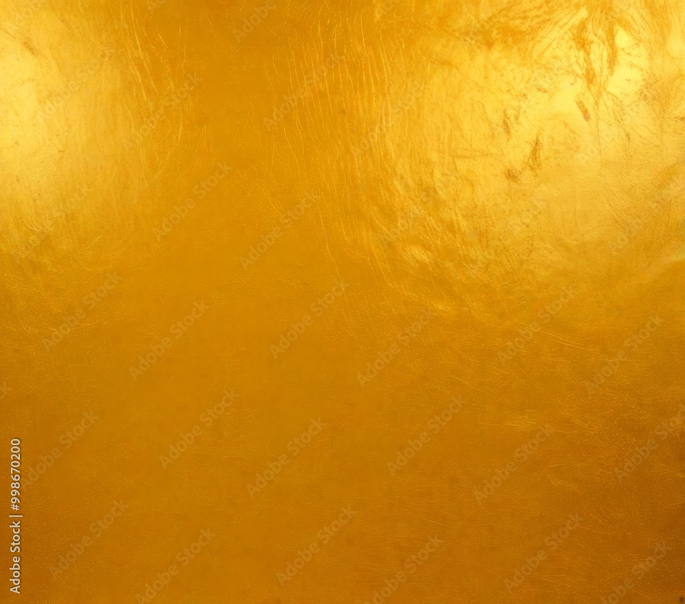 Poster a close-up view shiny, golden-colored surface with a textured, slightly crumpled appearance