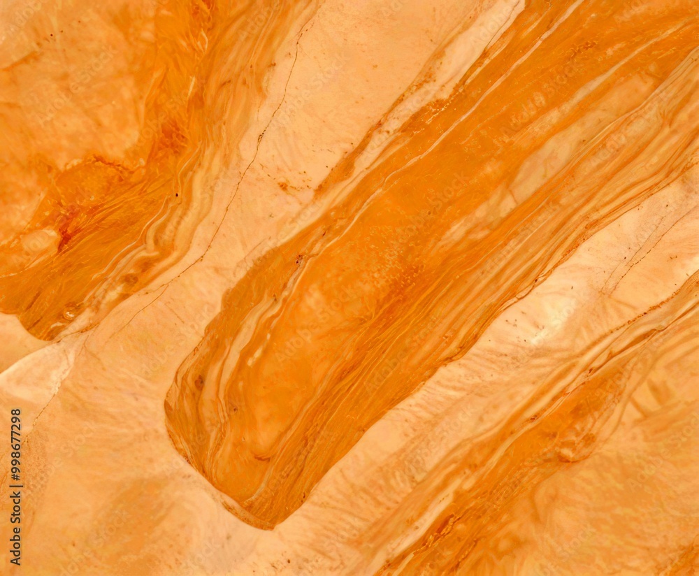 Aufkleber a marble surface with a light beige color and a subtle pattern of swirls and lines, creating a sense of movement and texture