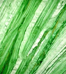 a close-up view green marble surface with a textured, striped pattern