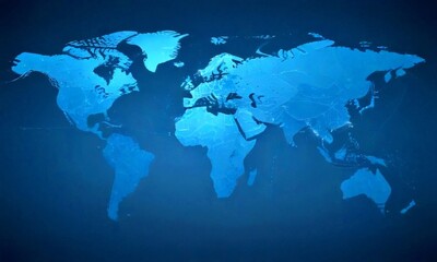 Fototapeta premium A stylized world map in shades of blue, with the continents and oceans clearly visible against a dark background