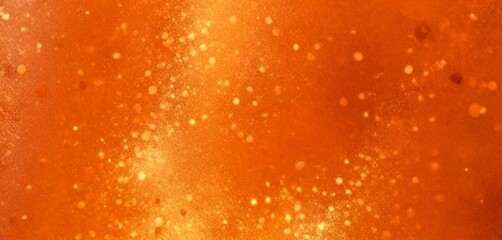 a close-up view textured orange surface with small white dots scattered across it, creating a sense of movement and depth