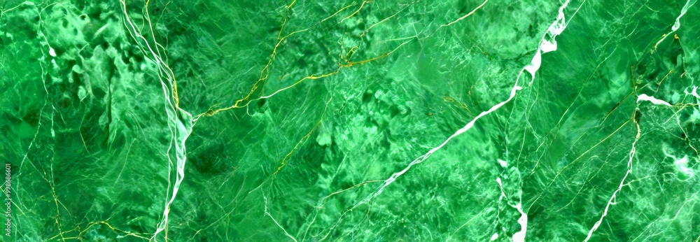 Poster a close-up view green marble surface with visible cracks and lines, creating a textured and intricate pattern