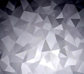 Obraz premium a gray, abstract background composed of numerous triangular shapes, creating a visually striking and geometric pattern