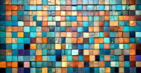 Fototapeta premium A mosaic of square tiles in various shades of blue, green, orange, and brown, arranged in a grid-like pattern