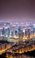 Obraz premium A panoramic view of Hong Kong's skyline at night, with the city's iconic skyscrapers and high-rise buildings illuminated against a dark, hazy sky