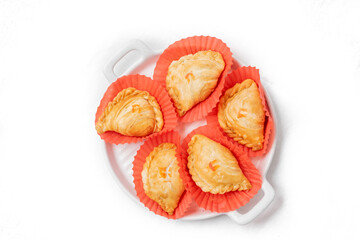 Curry puff is a Thai snack that has been influenced by foreign cultures.