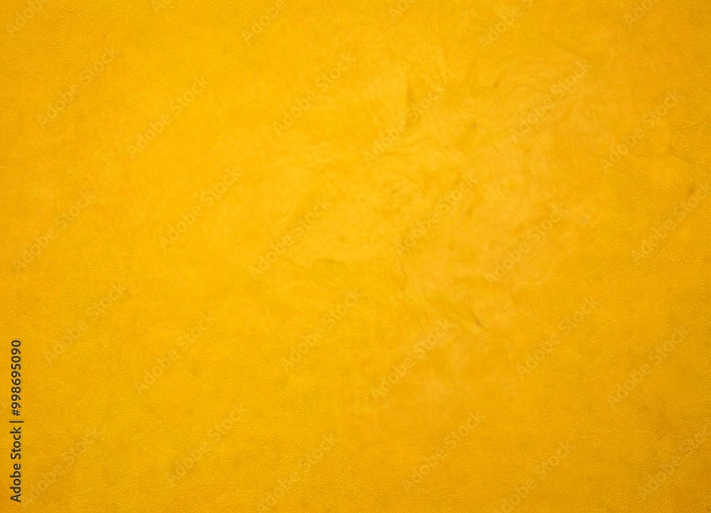 Poster a close-up view textured yellow surface, possibly a wall or a piece of paper, with a subtle pattern or design