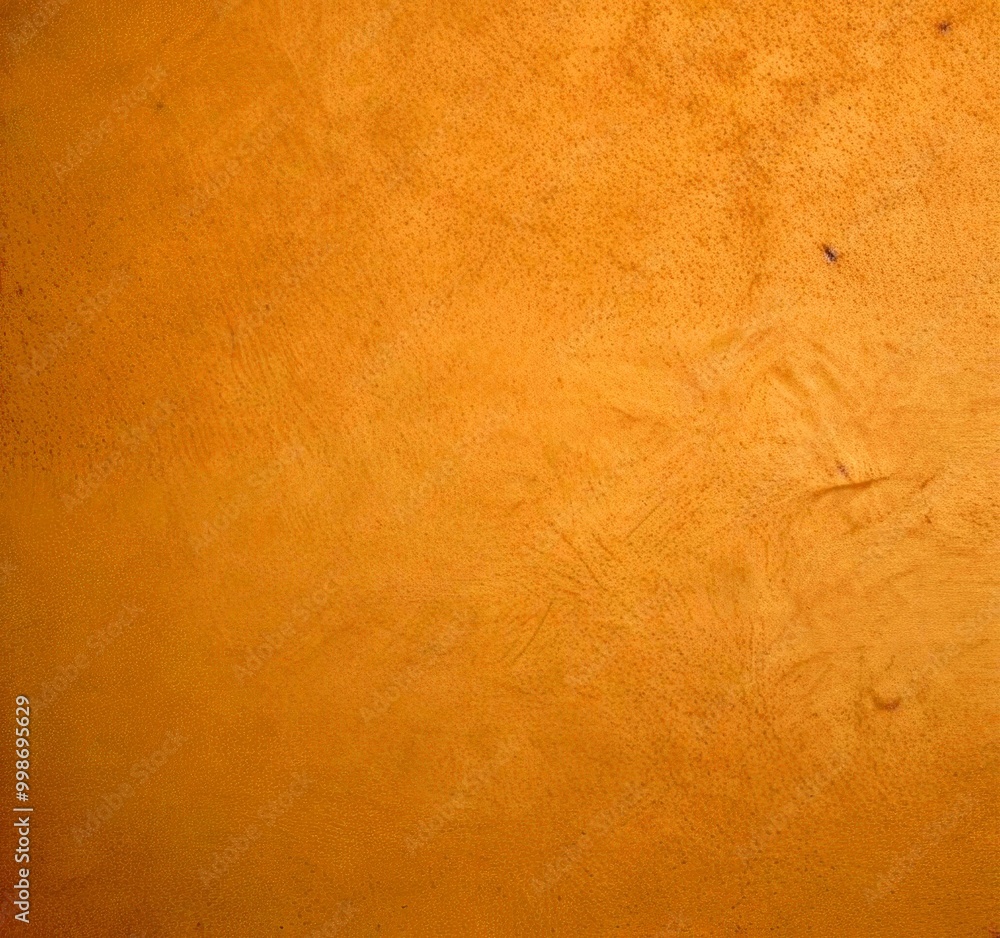 Poster a close-up textured beige surface, possibly a wall or a piece of furniture, with a subtle pattern of