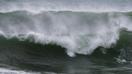 Image of white ocean waves.