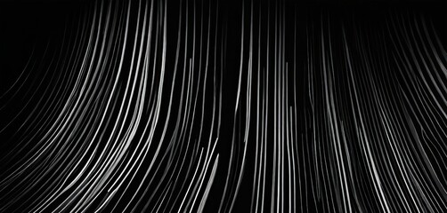 Obraz premium a black and white photograph featuring a repeating pattern of diagonal lines, creating a sense of movement and rhythm.