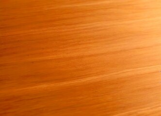 Fototapeta premium a close-up view wooden surface, with a blurred background that appears to be a wooden floor