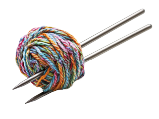 a ball of yarn on knitting needles
