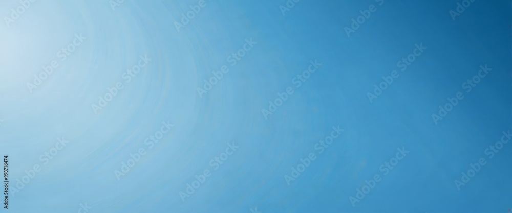Aufkleber a gradient of blue, transitioning from a lighter shade at the top to a darker one at the bottom The gradient appears to be smooth and continuous, with no discernible objects