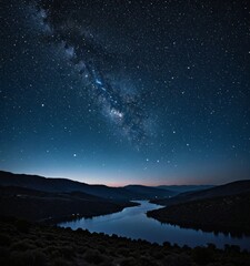 Fototapeta premium A serene night scene lake surrounded by mountains, with the Milky Way galaxy visible in the sky above