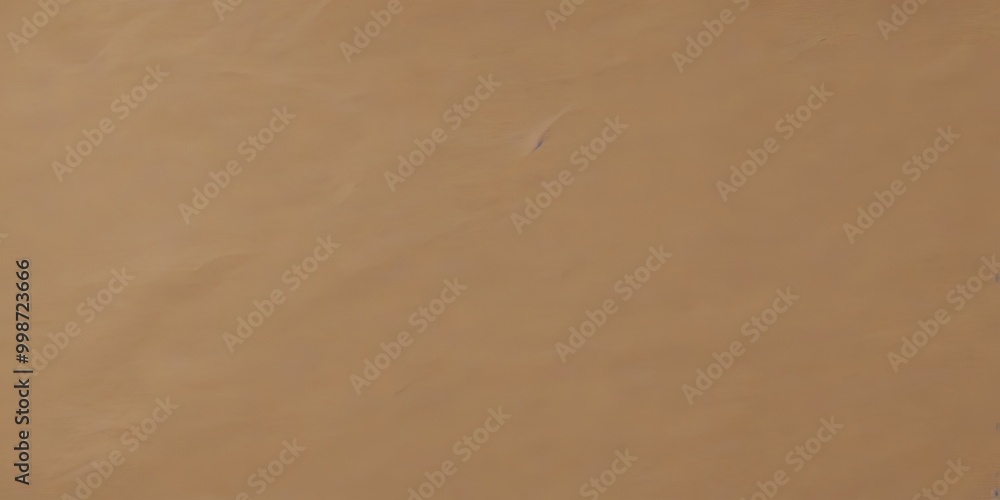 Poster a close-up view of a brown, textured surface, possibly a piece of paper or fabric, with a faint outl