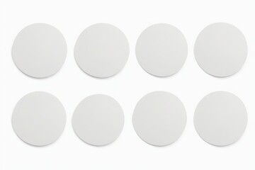 a close up of a white circle with six different white circles