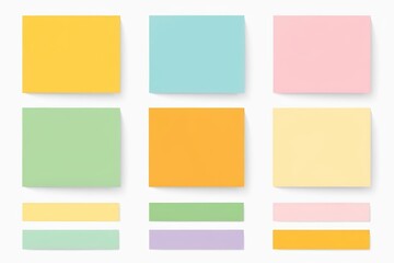 a close up of a bunch of sticky notes on a white surface